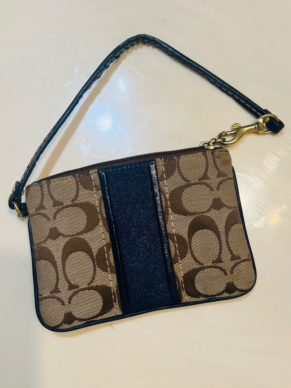 Coach Signature Canvas Wristlet in Brown with Black Stripe